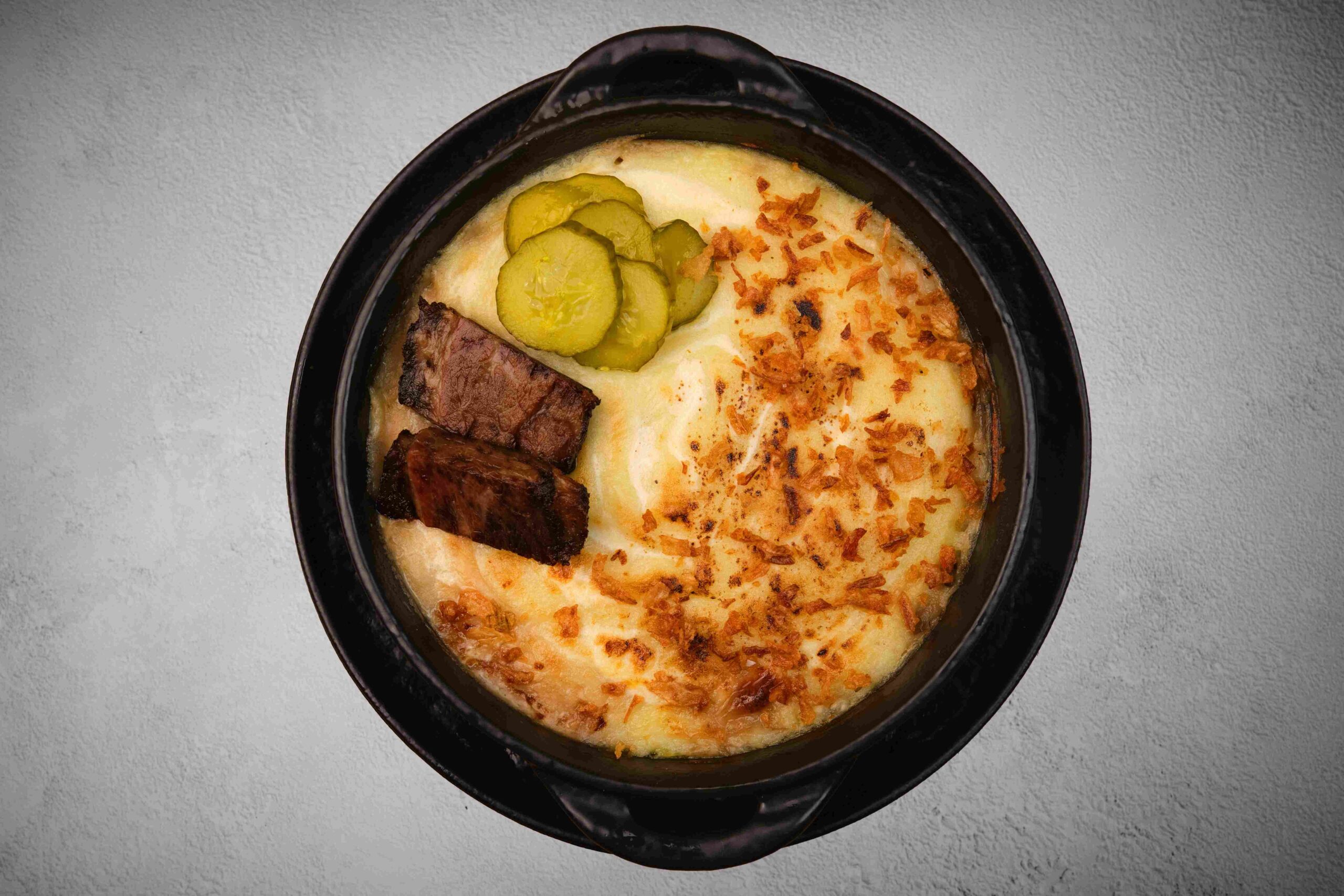 Картофельная запеканка с грибами и брискетом
